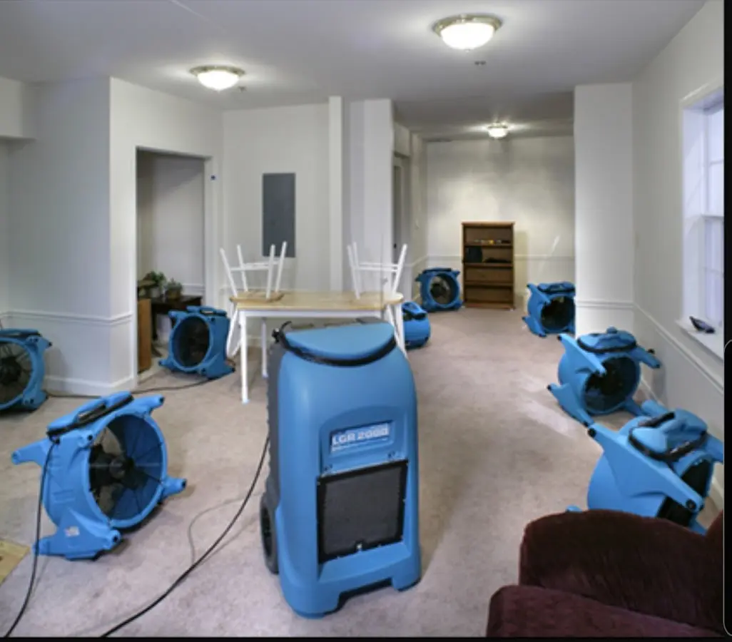 Air movers and dehumidifier setup for Water Damage Restoration in Germantown